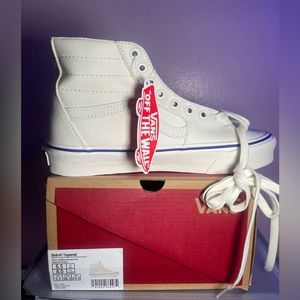 Brand new, never worn cream and and blue vans. Woman’s size 8.5.